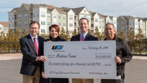 UGI Employees and KRE Employee holding $145,000 giant check